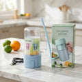 Electric smoothie maker with built-in straw and carrying handle